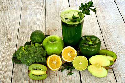 Green smootie with fruits and vegetables